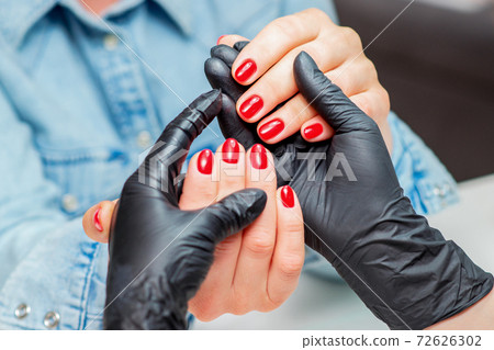 Red nails of woman. Red nails of woman. 72626302