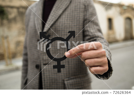 person showing a transgender symbol person showing a transgender symbol 72626364