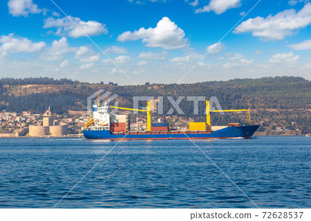 Container ship in Dardanelles strait, Turkey 72628537