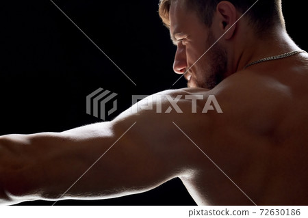 Sportsman having workout at gym Sportsman having workout at gym 72630186