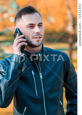 Young Man Using Smartphone for the Call Young Man Using Smartphone for the Call 72632341