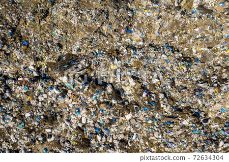 A dump aerial top view. Environmental pollution A dump aerial top view. Environmental pollution 72634304