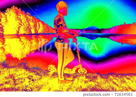 Boy with scooter stands on a park path along lake. Childhood sports concept. Boy with scooter stands on a park path along lake. Childhood sports concept. 72634561