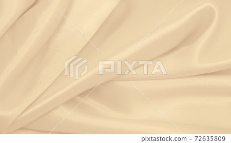 Smooth elegant golden silk or satin luxury cloth texture as wedding background. Luxurious background design. In Sepia toned. Retro style Smooth elegant golden silk or satin luxury cloth texture as wedding background. Luxurious background design. In Sepia toned. Retro style 72635809