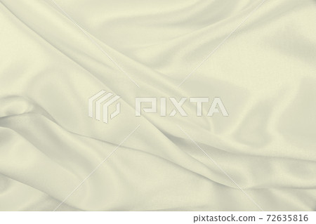 Smooth elegant golden silk or satin luxury cloth texture as wedding background. Luxurious background design. In Sepia toned. Retro style Smooth elegant golden silk or satin luxury cloth texture as wedding background. Luxurious background design. In Sepia toned. Retro style 72635816