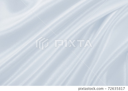 Smooth elegant grey silk or satin luxury cloth as wedding background. Luxurious background design Smooth elegant grey silk or satin luxury cloth as wedding background. Luxurious background design 72635817