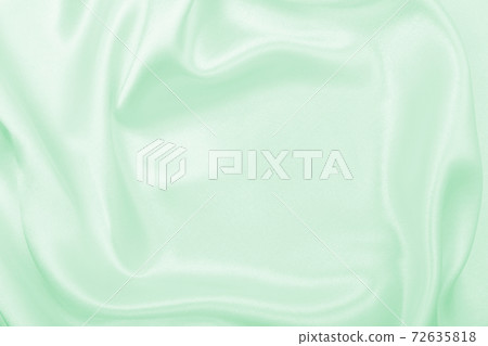Smooth elegant green silk or satin luxury cloth texture as abstract background. Luxurious background design Smooth elegant green silk or satin luxury cloth texture as abstract background. Luxurious background design 72635818