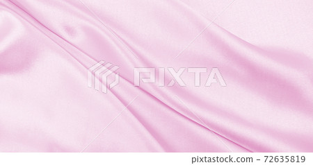 Smooth elegant pink silk or satin texture as wedding background. Luxurious background design Smooth elegant pink silk or satin texture as wedding background. Luxurious background design 72635819