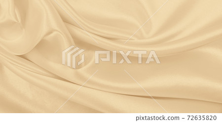 Smooth elegant golden silk or satin luxury cloth texture as wedding background. Luxurious background design. In Sepia toned. Retro style 72635820