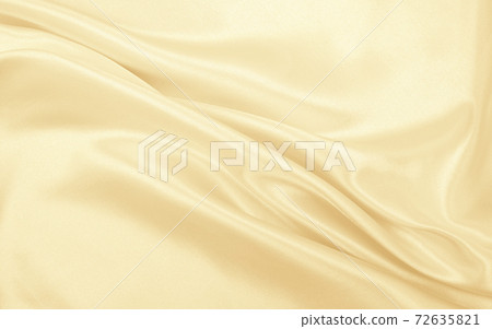 Smooth elegant golden silk or satin luxury cloth texture as wedding background. Luxurious background design. In Sepia toned. Retro style Smooth elegant golden silk or satin luxury cloth texture as wedding background. Luxurious background design. In Sepia toned. Retro style 72635821