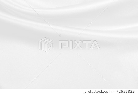 Smooth elegant white silk or satin luxury cloth texture as wedding background. Luxurious background design Smooth elegant white silk or satin luxury cloth texture as wedding background. Luxurious background design 72635822