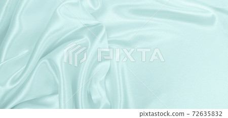 Smooth elegant blue silk or satin luxury cloth texture as abstract background. Luxurious background design Smooth elegant blue silk or satin luxury cloth texture as abstract background. Luxurious background design 72635832