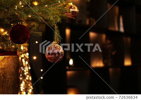 New Year 2021. Christmas beautiful lights bokeh on dark gold background 72636634