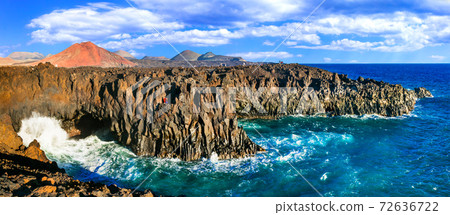 amazing Los Hervideros lava's caves in Lanzarote island, popular touristic attraction. Canary islands amazing Los Hervideros lava's caves in Lanzarote island, popular touristic attraction. Canary islands 72636722