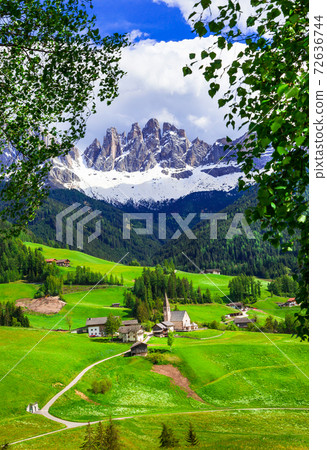 Alpine scenery - Dolomites mountains and traditional villages. Val di Funes, Italy 72636744