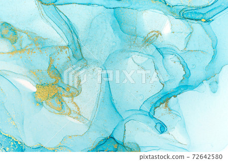 Alcohol ink blue and gold abstract stains on white background. Drops watercolor transparent texture. 72642580