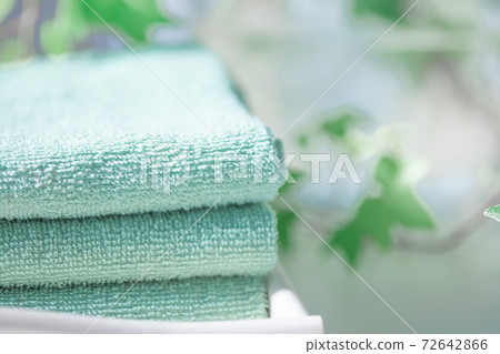 Folded and stacked towels 72642866