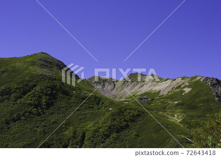 Summer blue sky and Mt. Senjogatake curl Summer blue sky and Mt. Senjogatake curl 72643418