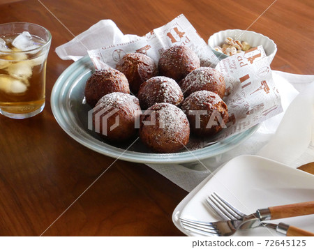Handmade chocolate donuts placed on the table 72645125