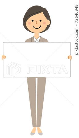 Woman in suit with whiteboard Woman in suit with whiteboard 72646949