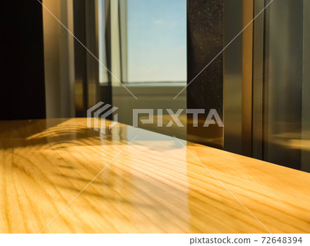 Glitter wooden table coated with golden gold pillars Glitter wooden table coated with golden gold pillars 72648394