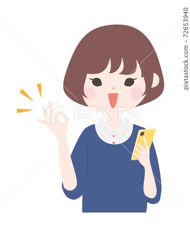 A young woman holding a smartphone and smiling and signing OK Upper body [no main line] 72653940