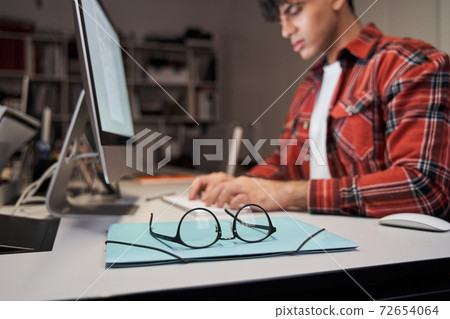 Man thinking about new project 72654064