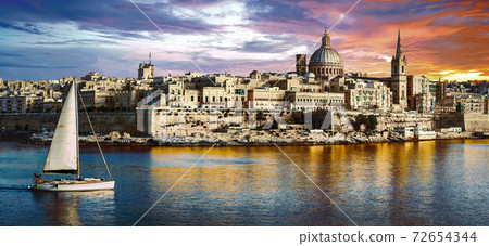 panoramic view of Valetta over sunset and with a sail boat. Malta 72654344