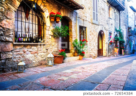 charming streets of medieval italian town Assisi in Umbria 72654384