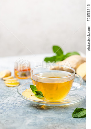 Ginger tea in a glass cup 72655246