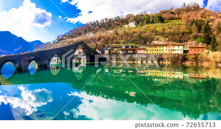 Ponte Diavolo - pictorial medieval Devil's bridge near Lucca, Tuscany, Italy 72655713
