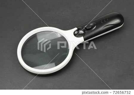 Magnifying glass isolated on black Magnifying glass isolated on black 72656732