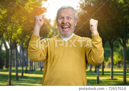 Portrait of happy senior grandfather. 72657018