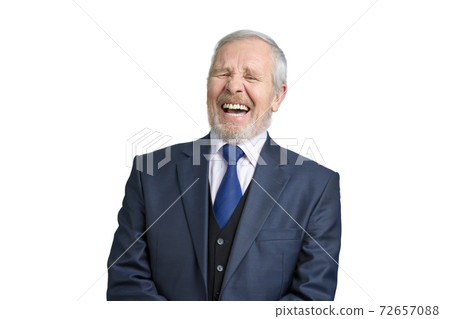 Senior businessman laughing hard. Senior businessman laughing hard. 72657088