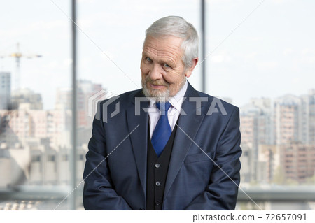 Old businessman gaze portrait. Old businessman gaze portrait. 72657091