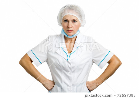 Serious female mature doctor. 72657393