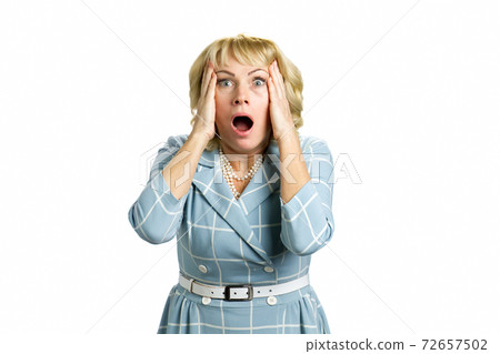 Portrait of woman with shocked reaction. Portrait of woman with shocked reaction. 72657502