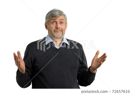 Confused mature man on white background. Confused mature man on white background. 72657610