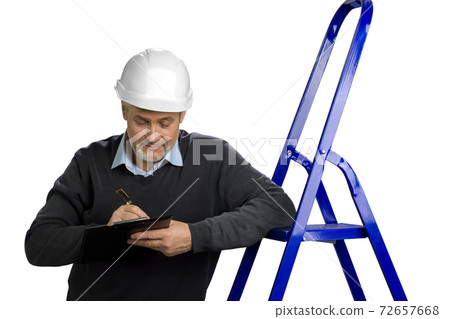 Portrait of mature building inspector. 72657668