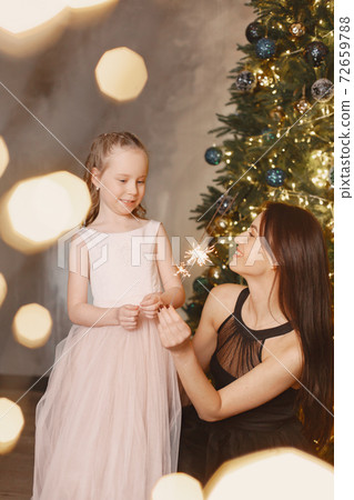 Mother with little daughter at home Mother with little daughter at home 72659788