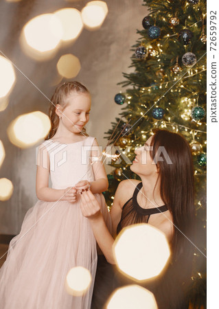 Mother with little daughter at home Mother with little daughter at home 72659792