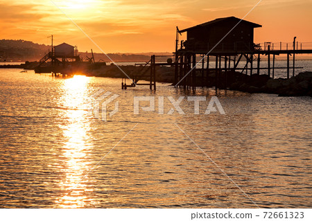 Stilt house over the sea at sunset Stilt house over the sea at sunset 72661323