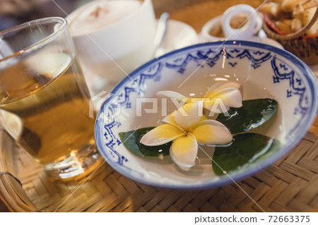 Cappuccino coffee served in a Thai style coffee shop Cappuccino coffee served in a Thai style coffee shop 72663375