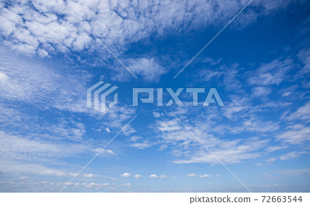 Background picture bright blue sky and white clouds 72663544