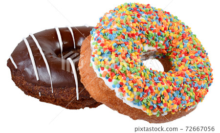 Two donut in a multicolored confectionery dressing isolated 72667056