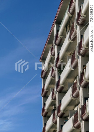 Retro mansion veranda and blue sky 72669343