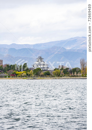 Nagahama Castle (simulated castle tower) history museum seen from Lake Biwa pleasure boat 72669489