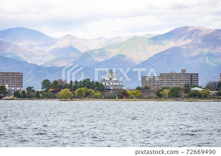 Nagahama Castle (simulated castle tower) history museum seen from Lake Biwa pleasure boat 72669490