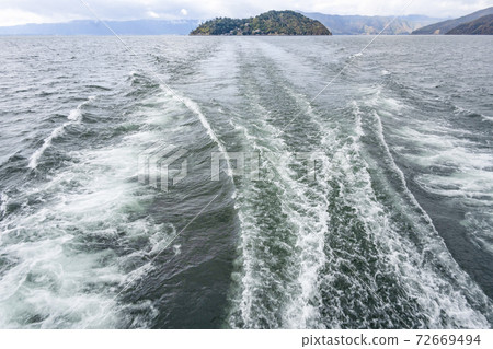 Chikubu Island seen from Lake Biwa pleasure boat 72669494