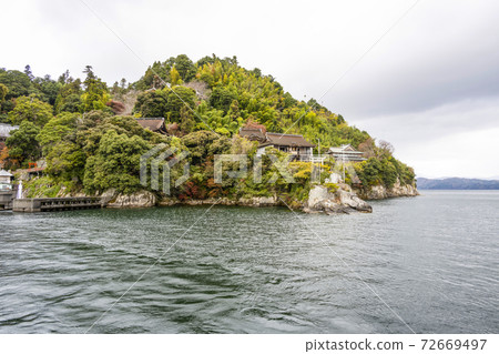 Chikubu Island seen from Lake Biwa pleasure boat 72669497